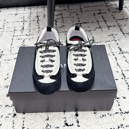 CHANEL 26S LACE-UP SNEAKERS IN WHITE AND BLACK SUEDE