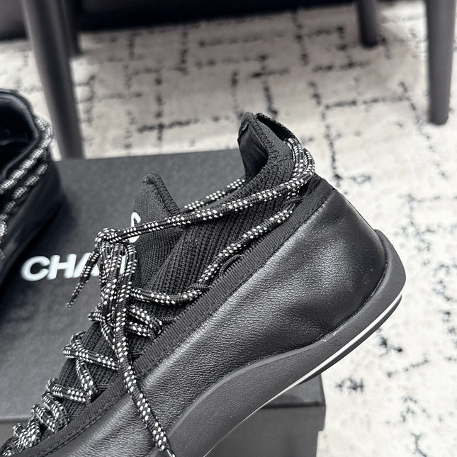 CHANEL 26S LACE-UP SNEAKERS IN BLACK FABRIC AND LAMBSKIN