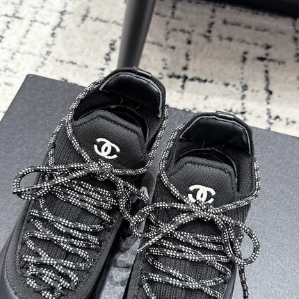 CHANEL 26S LACE-UP SNEAKERS IN BLACK FABRIC AND LAMBSKIN