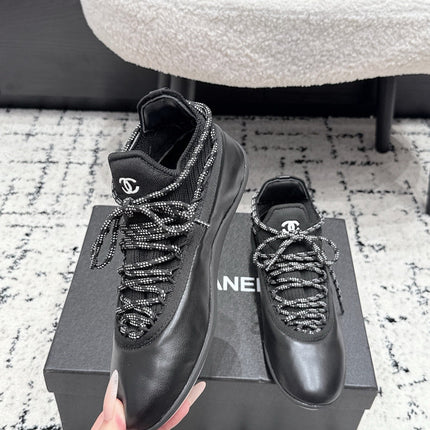 CHANEL 26S LACE-UP SNEAKERS IN BLACK FABRIC AND LAMBSKIN