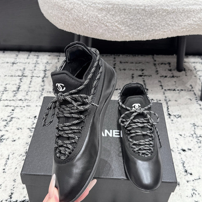 CHANEL 26S LACE-UP SNEAKERS IN BLACK FABRIC AND LAMBSKIN