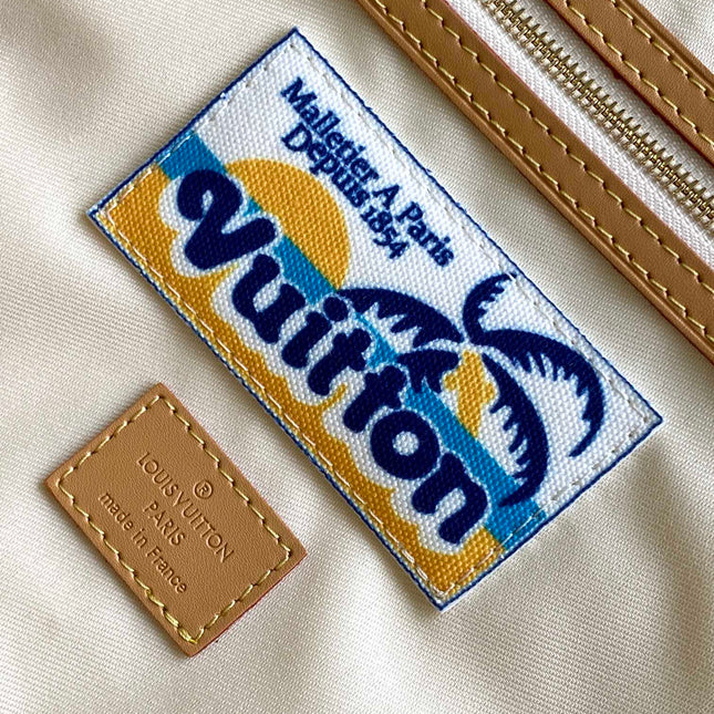 KEEPALL BANDOULIÈRE 50 IN SAND TROPICAL MOTIFS MONOGRAM SURFIN CANVAS