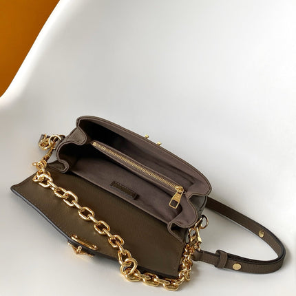 POCHETTE METIS EAST WEST 22 IN BROWN MONOGRAM EMBOSSED CALFSKIN