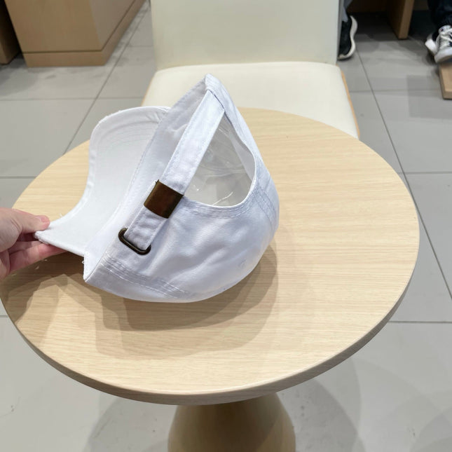 MIUMIU DISTRESSED FABRIC BASEBALL CAP IN WHITE WITH EMBROIDERED LOGO