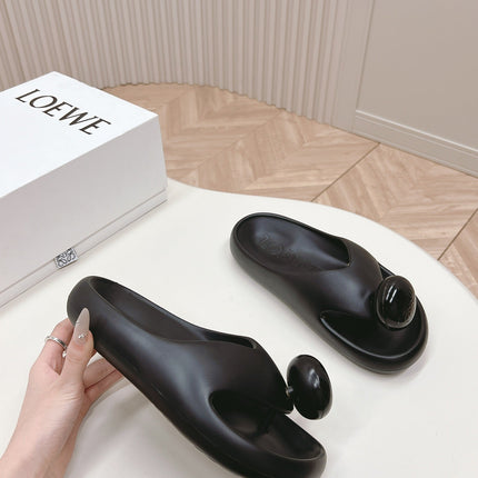 LOEWE 26S PEBBLE TOE-POST SLIDES IN BLACK EVA