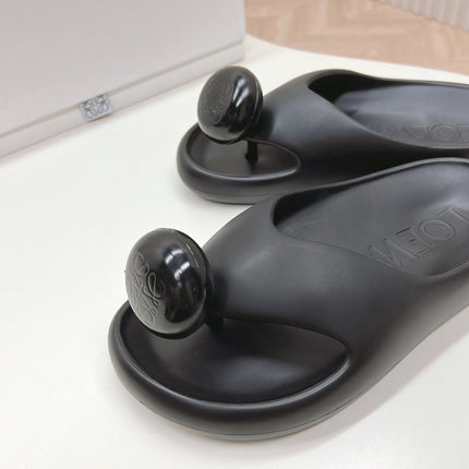 LOEWE 26S PEBBLE TOE-POST SLIDES IN BLACK EVA