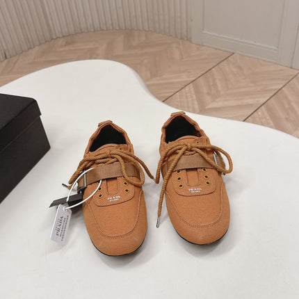PRADA 26S LACE UP MINIMAL SNEAKERS IN CARAMEL BROWN CANVAS