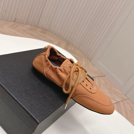 PRADA 26S LACE UP MINIMAL SNEAKERS IN CARAMEL BROWN CANVAS