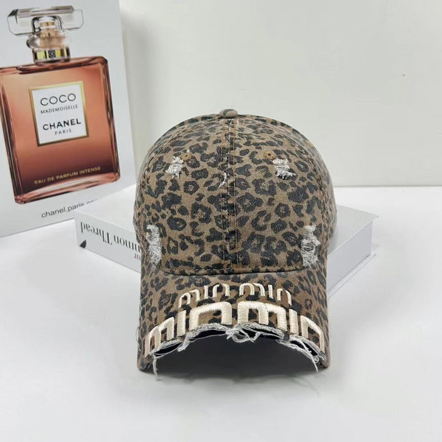MIUMIU DISTRESSED EMBROIDERED BASEBALL CAP DENIM