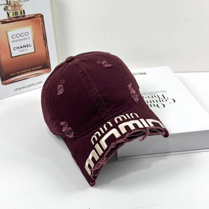 MIUMIU DISTRESSED EMBROIDERED BASEBALL CAP DENIM