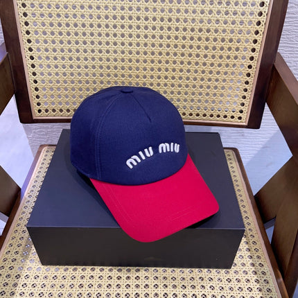MIUMIU BASEBALL CAP IN NAVY BLUE AND RED FABRIC WITH LOGO EMBROIDERY