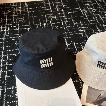 MIUMIU CLASSIC REVERSIBLE BUCKET HAT IN LIGHT BEIGE AND BLACK FABRIC