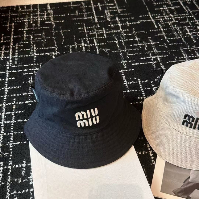 MIUMIU CLASSIC REVERSIBLE BUCKET HAT IN LIGHT BEIGE AND BLACK FABRIC