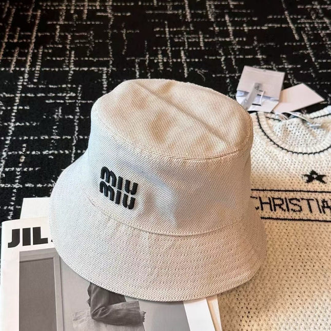 MIUMIU CLASSIC REVERSIBLE BUCKET HAT IN LIGHT BEIGE AND BLACK FABRIC
