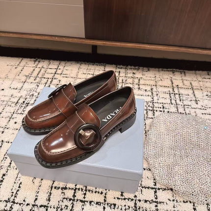 PRADA 26S BUCKLED LOAFERS IN DARK BROWN SHINY CALFSKIN