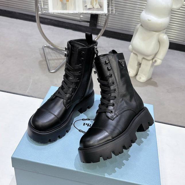 PRADA 25S WARRIOR BOOTS IN BLACK CALFSKIN