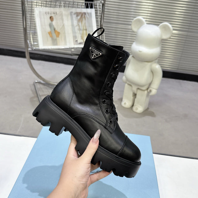 PRADA 25S WARRIOR BOOTS IN BLACK CALFSKIN