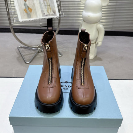 PRADA 25S ZIP-UP ANKLE BOOTS IN BROWN CALFSKIN