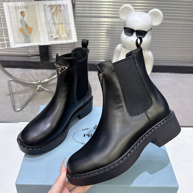 PRADA 25S RETRO PLATFORM MARTIN BOOTS IN BLACK CALFSKIN