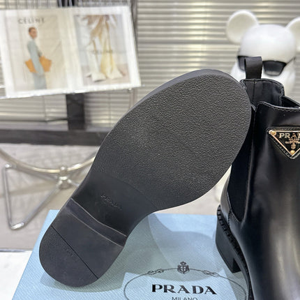 PRADA 25S RETRO PLATFORM MARTIN BOOTS IN BLACK CALFSKIN