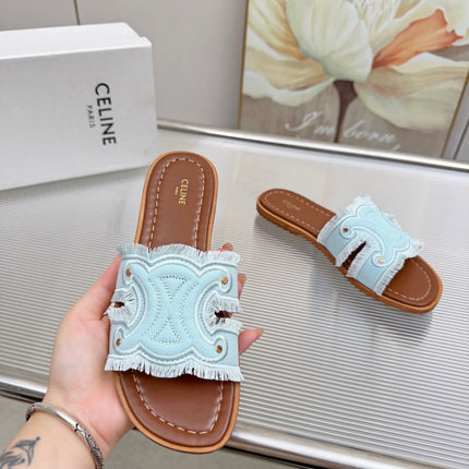 CELINE 26S TRIOMPHE SLIDE SANDALS IN SKY BLUE CANVAS