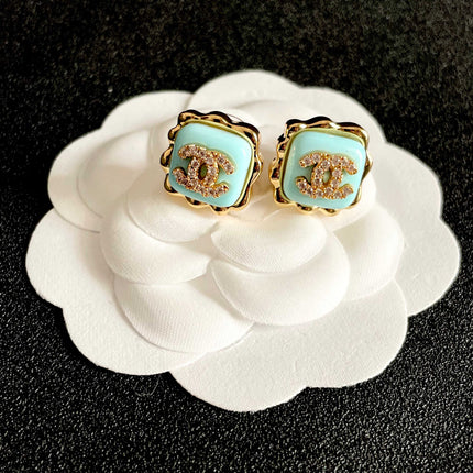 CHANEL 26S DOUBLE C LOGO MINT ENAMEL SQUARE STUD EARRINGS WITH CRYSTAL DETAIL IN GOLD METAL 631028