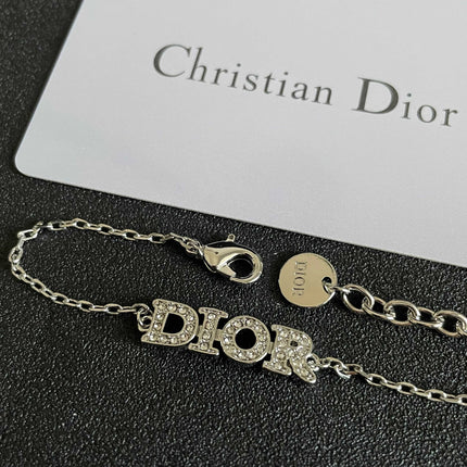 CD 26S PAVE LOGO LETTER BRACELET IN SILVER TONE METAL 631807