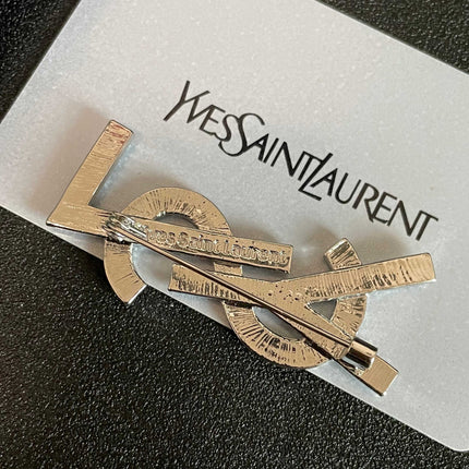 YSL 26S CRYSTAL LOGO BROOCH IN SILVER TONE METAL 634974