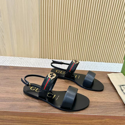 GUCCI 26S STRAP FLAT SANDALS IN BLACK CALFSKIN GOLD HARDWARE