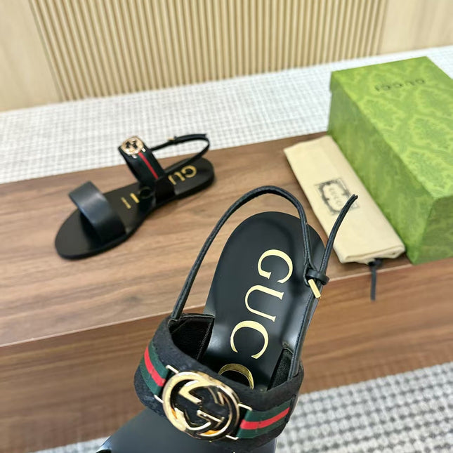 GUCCI 26S STRAP FLAT SANDALS IN BLACK CALFSKIN GOLD HARDWARE