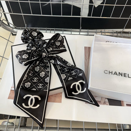 CHANEL 26S HAIR SCRUNCHIE IN BLACK SILK 503074
