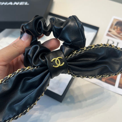 CHANEL 26S BOW SCRUNCHIE IN BLACK LEATHER 512119