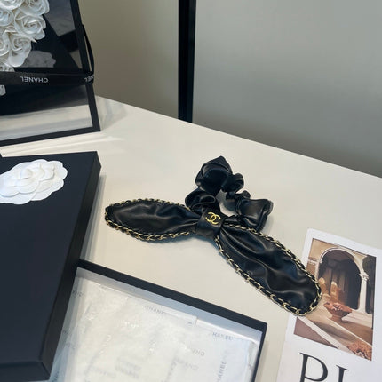 CHANEL 26S BOW SCRUNCHIE IN BLACK LEATHER 512119