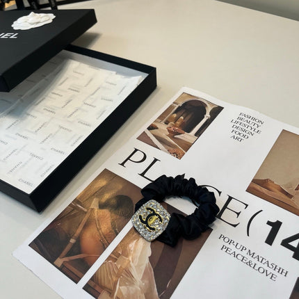CHANEL 26S HAIR TIE IN BLACK FABRIC 503108