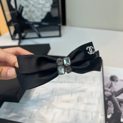 CHANEL 26S HEADBAND IN BLACK SATIN BOW 503102