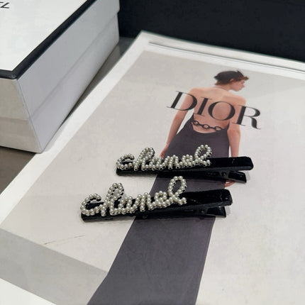 CHANEL 26S BOW HAIR CLIP IN BLACK RHINESTONE SCRIPT 505309