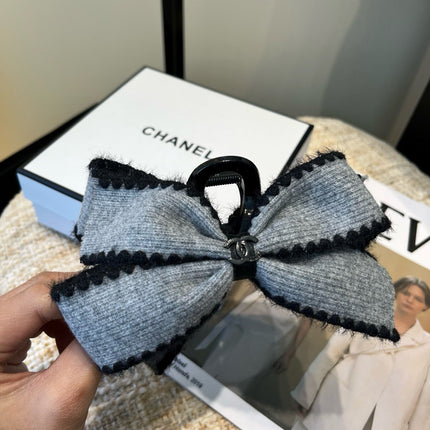 CHANEL 26S BOW HAIR CLIP IN GREY FABRIC 512107