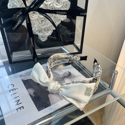 DIOR 26S BOW HEADBAND IN WHITE SATIN 500642