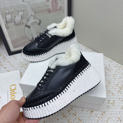CHLOÉ 26S WEDGE SOLE SNEAKERS IN BLACK CALFSKIN