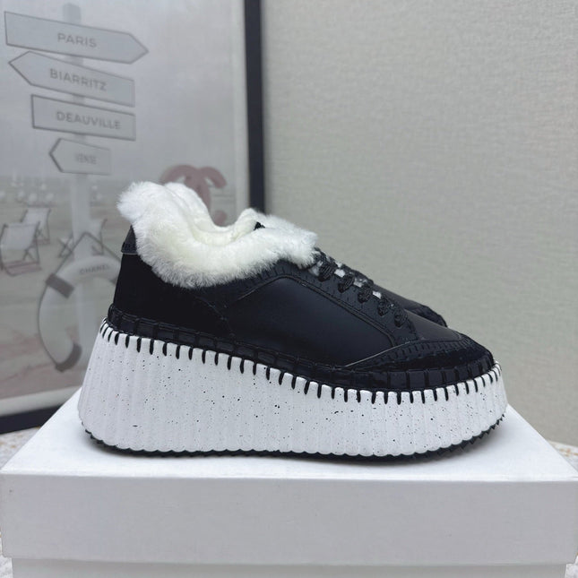 CHLOÉ 26S WEDGE SOLE SNEAKERS IN BLACK CALFSKIN