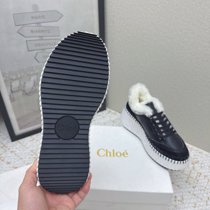 CHLOÉ 26S WEDGE SOLE SNEAKERS IN BLACK CALFSKIN