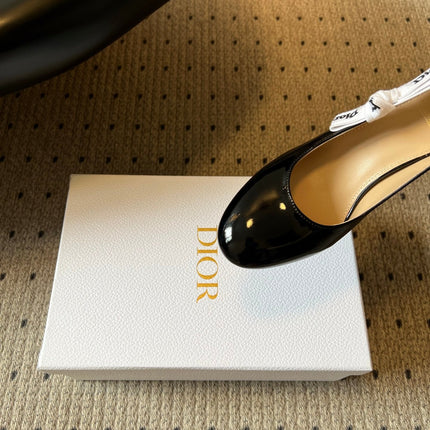 DIOR 26S HIGH HEELS 80 MM IN BLACK PATENT CALFSKIN WITH RIBBON BOW