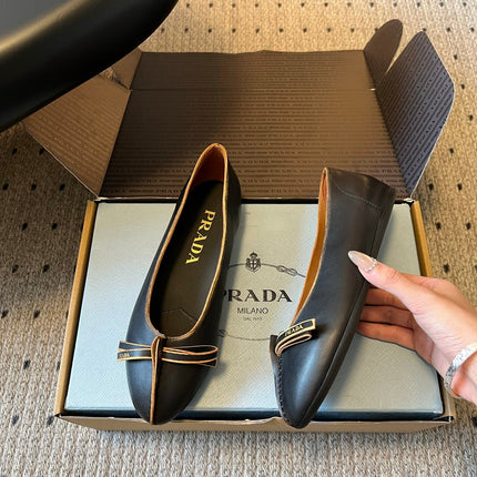 PRADA 26S POINTED TOE BOW FLATS IN BLACK CALFSKIN