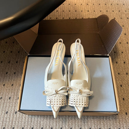 PRADA 26S POINTED TOE FRINGE BOW SLINGBACK PUMPS 55MM IN IVORY WHITE CALFSKIN