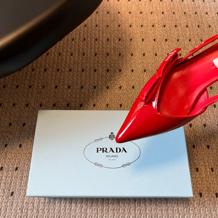 PRADA 26S BOW DETAIL SLINGBACK PUMPS 55MM IN RED PATENT CALFSKIN