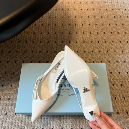 PRADA 26S BOW DETAIL SLINGBACK PUMPS 55MM IN WHITE PATENT CALFSKIN