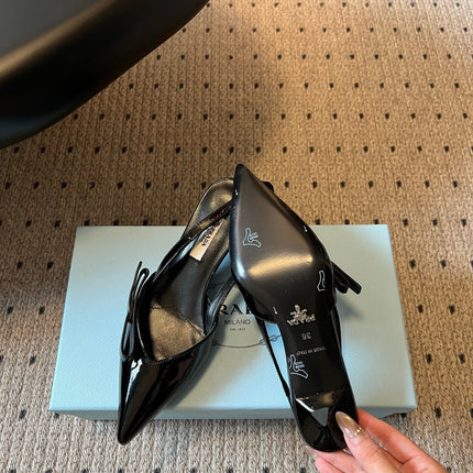 PRADA 26S BOW DETAIL SLINGBACK PUMPS 55MM IN BLACK PATENT CALFSKIN