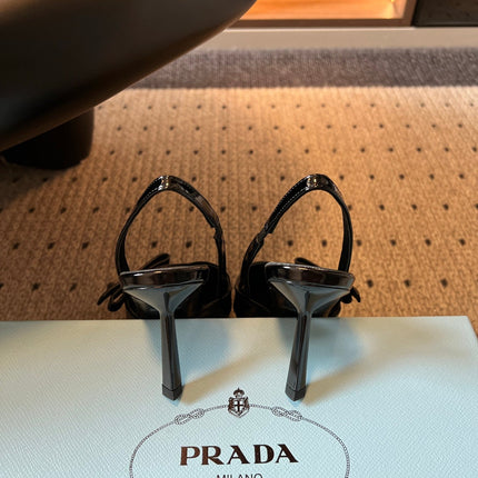 PRADA 26S BOW DETAIL SLINGBACK PUMPS 75MM IN BLACK PATENT CALFSKIN