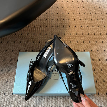 PRADA 26S BOW DETAIL SLINGBACK PUMPS 75MM IN BLACK PATENT CALFSKIN