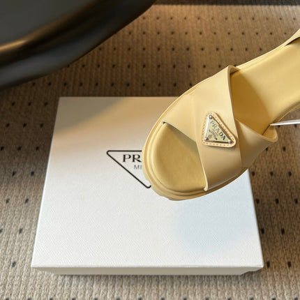 PRADA 26S BLOCK HEEL SANDALS 85MM IN BEIGE EVA FOAM
